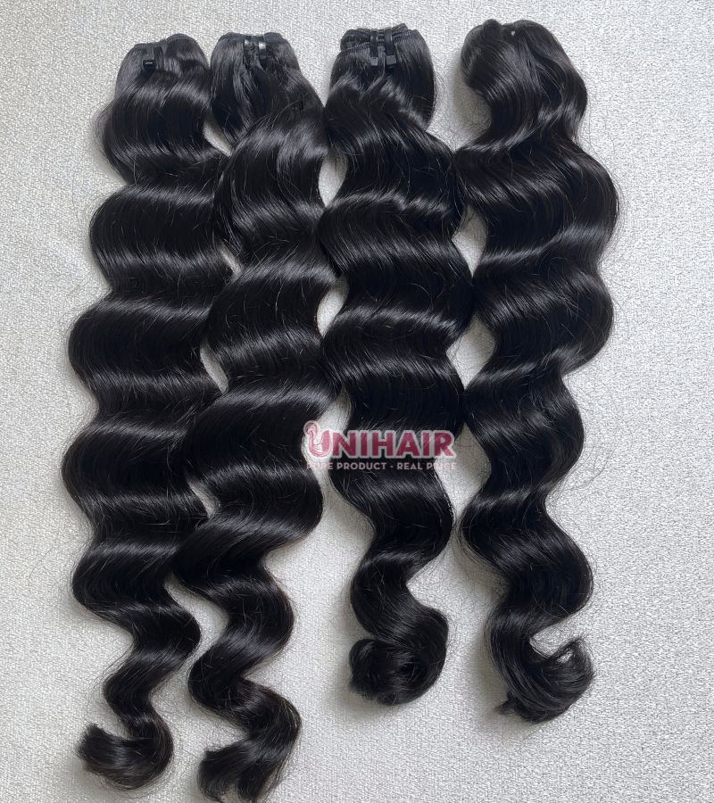 Raw cambodian wavy hair bundles