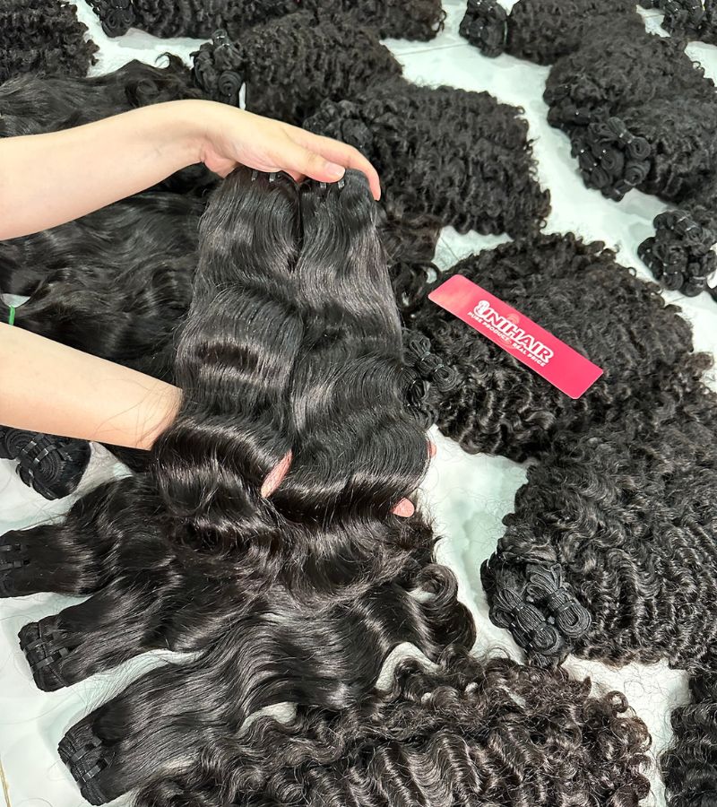 Raw natural wavy hair bundles